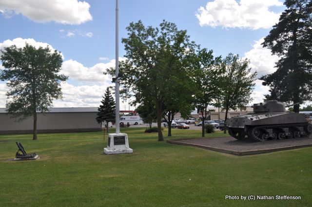 retired army tank, flag pole