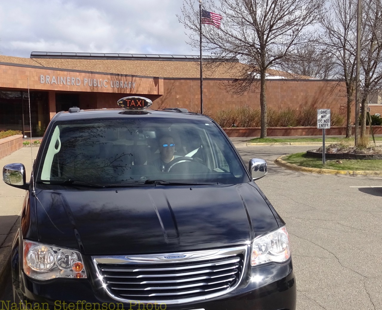 black grab-a-cab Taxi (front)
