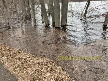 boom lake flowing over trail